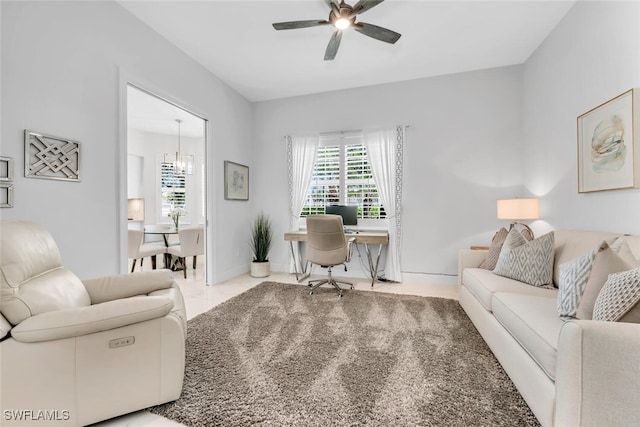 605 El Camino Real Unit 102, Naples, FL 34119 - office with a ceiling fan, a chandelier, and baseboards