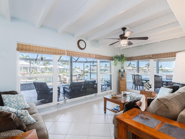 242 Angler Ct, Marco Island, FL 34145 - living room with beamed ceiling, ceiling fan, and light tile patterned floors