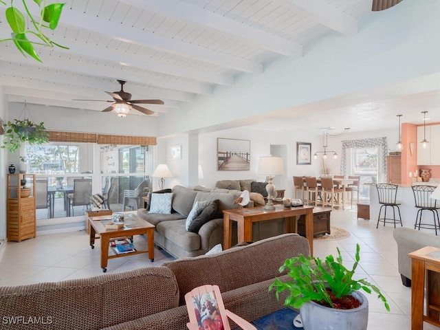242 Angler Ct, Marco Island, FL 34145 - living area featuring light tile patterned floors, ceiling fan, and beamed ceiling