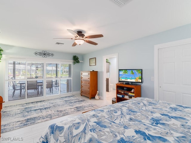 242 Angler Ct, Marco Island, FL 34145 - bedroom featuring ceiling fan, ensuite bath, and baseboards