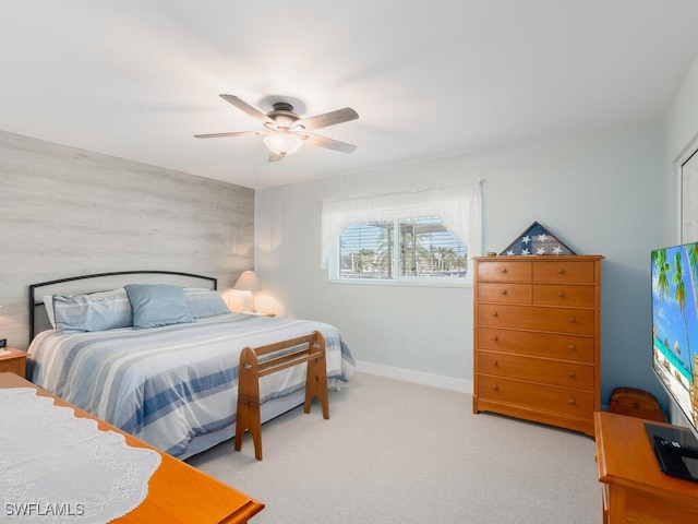 242 Angler Ct, Marco Island, FL 34145 - bedroom featuring a ceiling fan, baseboards, and carpet flooring