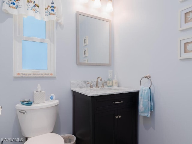 242 Angler Ct, Marco Island, FL 34145 - bathroom featuring vanity and toilet