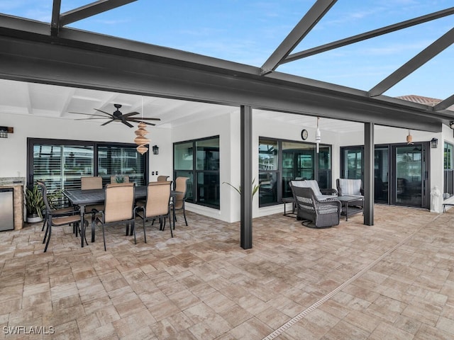 242 Angler Ct, Marco Island, FL 34145 - view of patio featuring ceiling fan, outdoor dining space, and glass enclosure