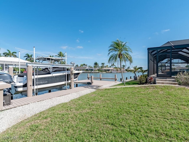 242 Angler Ct, Marco Island, FL 34145 - dock area with boat lift, a lawn, a water view, and glass enclosure
