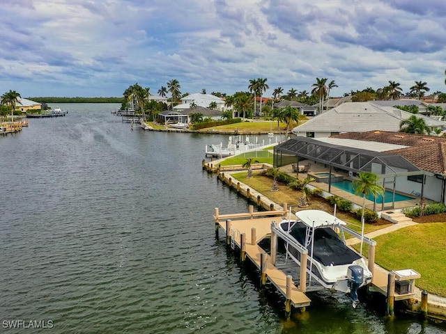 242 Angler Ct, Marco Island, FL 34145 - dock area featuring boat lift, a water view, glass enclosure, and a pool with connected hot tub