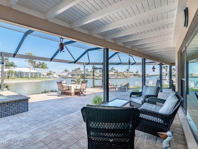 242 Angler Ct, Marco Island, FL 34145 - view of patio with a water view, a lanai, an outdoor living space, and outdoor dining area