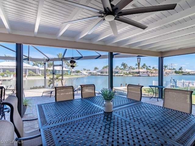 242 Angler Ct, Marco Island, FL 34145 - view of patio / terrace featuring a water view, outdoor dining space, a ceiling fan, and a lanai