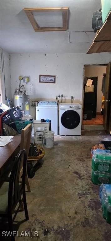2027 44th St SW, Naples, FL 34116 - washroom with attic access, washing machine and dryer, and water heater
