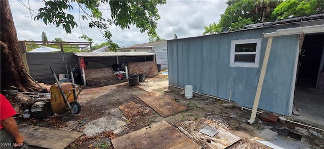 2027 44th St SW, Naples, FL 34116 - view of patio featuring an outdoor structure