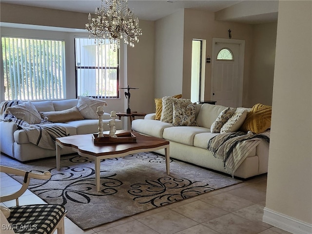 260 29th St SW, Naples, FL 34117 - tiled living area with a chandelier