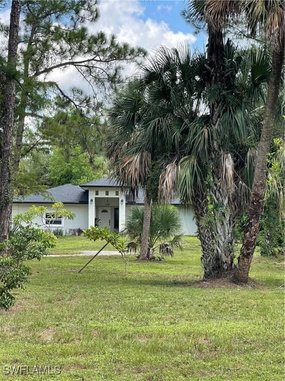 260 29th St SW, Naples, FL 34117 - view of green lawn