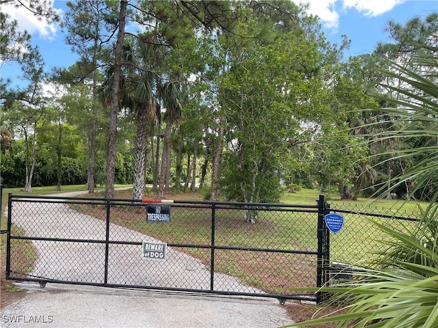 260 29th St SW, Naples, FL 34117 - view of community featuring a gate