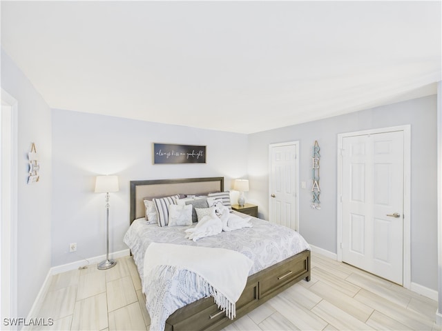 5600 Bonita Beach Rd Unit 201, Bonita Springs, FL 34134 - bedroom featuring baseboards