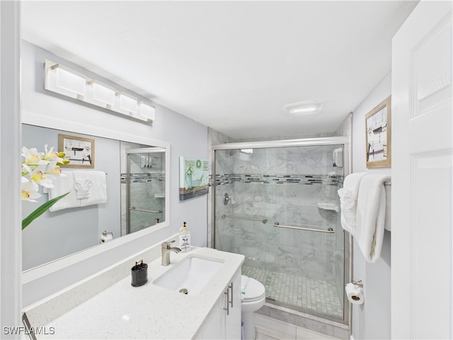 5600 Bonita Beach Rd Unit 201, Bonita Springs, FL 34134 - full bath with vanity, a stall shower, and toilet