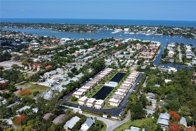 1155 Sandpiper St Unit D4, Naples, FL 34102 - aerial overview of property's location with a large body of water and nearby suburban area