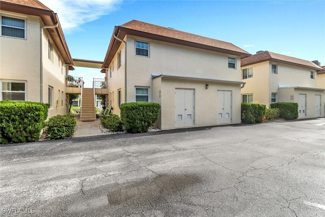 1155 Sandpiper St Unit D4, Naples, FL 34102 - view of property with stairway