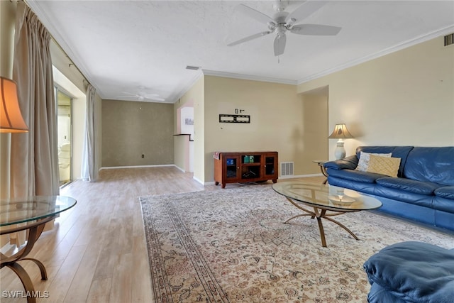1155 Sandpiper St Unit D4, Naples, FL 34102 - living area featuring ceiling fan, crown molding, and light wood-type flooring