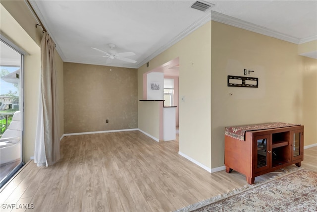 1155 Sandpiper St Unit D4, Naples, FL 34102 - spare room with crown molding, light wood finished floors, plenty of natural light, and a ceiling fan