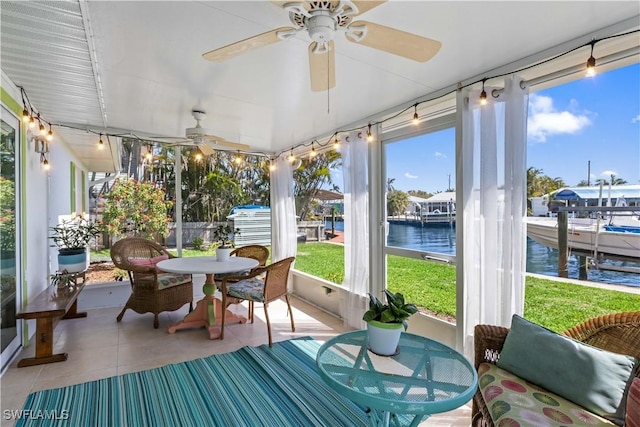 2839 Janet St, Matlacha, FL 33993 - sunroom / solarium featuring a water view, a ceiling fan, and outdoor dining area