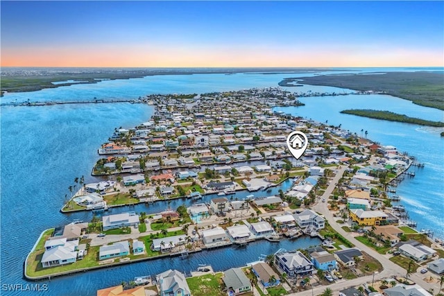 2839 Janet St, Matlacha, FL 33993 - aerial perspective of suburban area featuring a large body of water