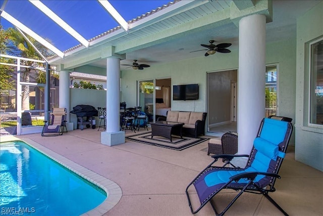 623 SW 56th St, Cape Coral, FL 33914 - outdoor pool featuring a ceiling fan, a patio area, and a lanai
