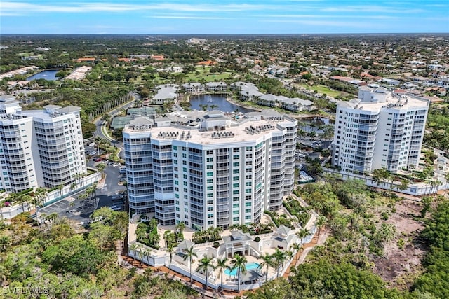 315 Dunes Blvd Unit 1006, Naples, FL 34110 - drone / aerial view of a large body of water and apartment complex