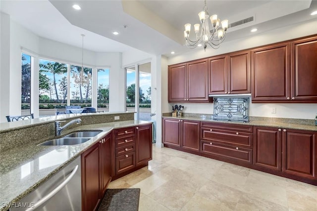 1050 Borghese Ln Unit 106, Naples, FL 34114 - kitchen with a chandelier, stainless steel dishwasher, a sink, decorative light fixtures, and recessed lighting
