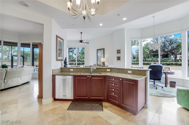 1050 Borghese Ln Unit 106, Naples, FL 34114 - kitchen featuring a chandelier, dishwasher, a sink, light stone counters, and hanging light fixtures