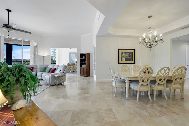 1050 Borghese Ln Unit 106, Naples, FL 34114 - dining room with a chandelier, a ceiling fan, ornamental molding, and baseboards