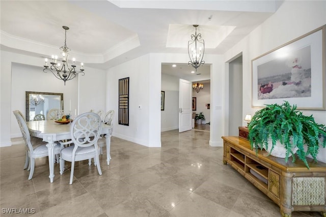 1050 Borghese Ln Unit 106, Naples, FL 34114 - dining space featuring a chandelier, a tray ceiling, baseboards, light marble finish floors, and ornamental molding