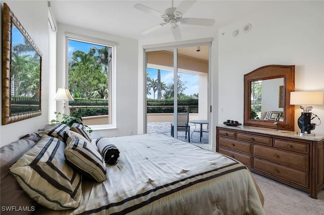 1050 Borghese Ln Unit 106, Naples, FL 34114 - bedroom with access to exterior, light carpet, multiple windows, and ceiling fan