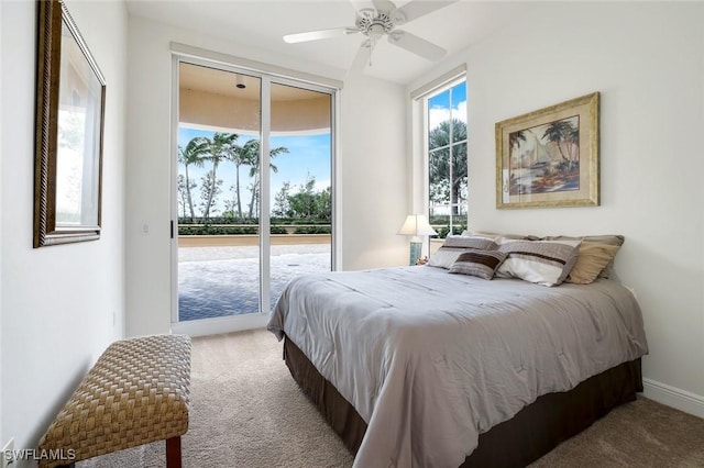 1050 Borghese Ln Unit 106, Naples, FL 34114 - bedroom with carpet flooring, access to exterior, and a ceiling fan