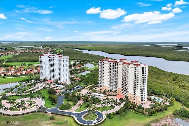 1050 Borghese Ln Unit 106, Naples, FL 34114 - bird's eye view of a large body of water and apartment complex