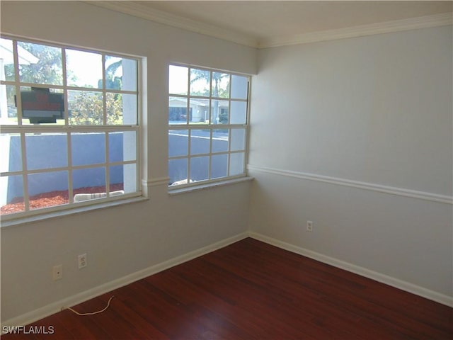 100 Waterview Ave, Lehigh Acres, FL 33936 - unfurnished room featuring wood finished floors, ornamental molding, and baseboards