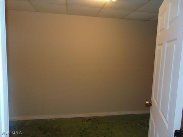 100 Waterview Ave, Lehigh Acres, FL 33936 - empty room with a paneled ceiling and baseboards
