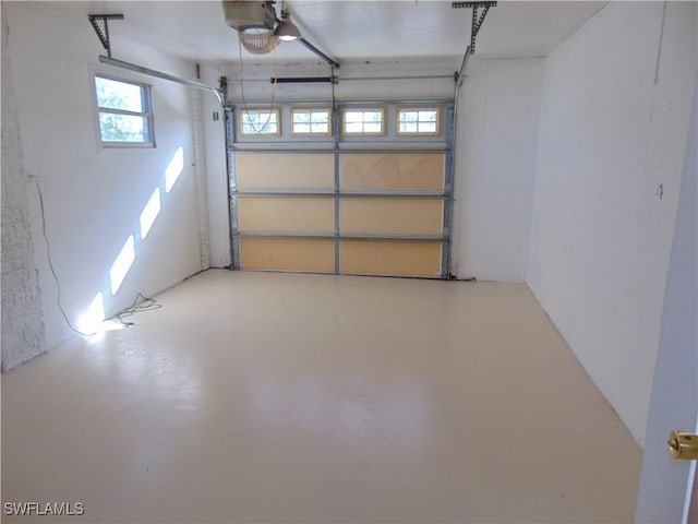100 Waterview Ave, Lehigh Acres, FL 33936 - garage featuring a garage door opener