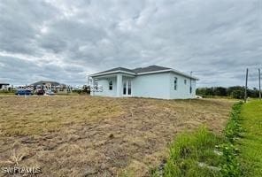 426 Mercedes Ct, Lehigh Acres, FL 33972 - view of side of home