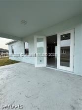 426 Mercedes Ct, Lehigh Acres, FL 33972 - view of patio / terrace