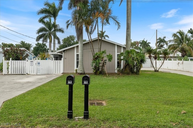 51-55 Lake St, North Fort Myers, FL 33903 - view of front facade featuring concrete driveway