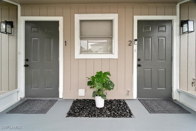 51-55 Lake St, North Fort Myers, FL 33903 - doorway to property with covered porch