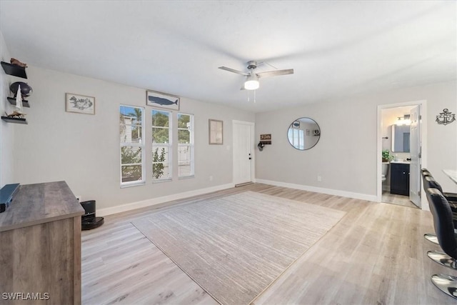 51-55 Lake St, North Fort Myers, FL 33903 - foyer featuring light wood-type flooring, a ceiling fan, and baseboards