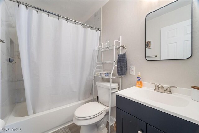 51-55 Lake St, North Fort Myers, FL 33903 - bathroom with toilet, shower / tub combo, and vanity