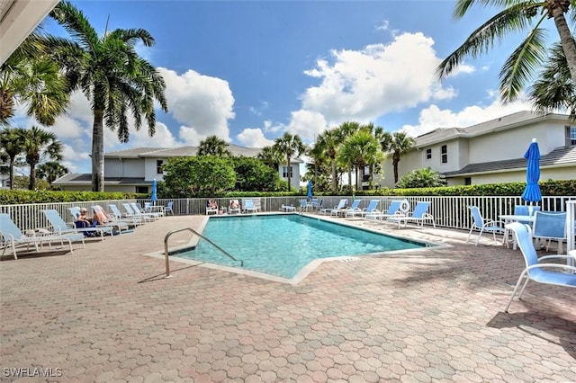 8375 Whisper Trace Ln Unit M203, Naples, FL 34114 - community pool with a patio