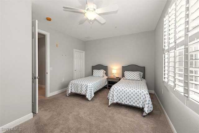 8375 Whisper Trace Ln Unit M203, Naples, FL 34114 - carpeted bedroom with a ceiling fan and baseboards