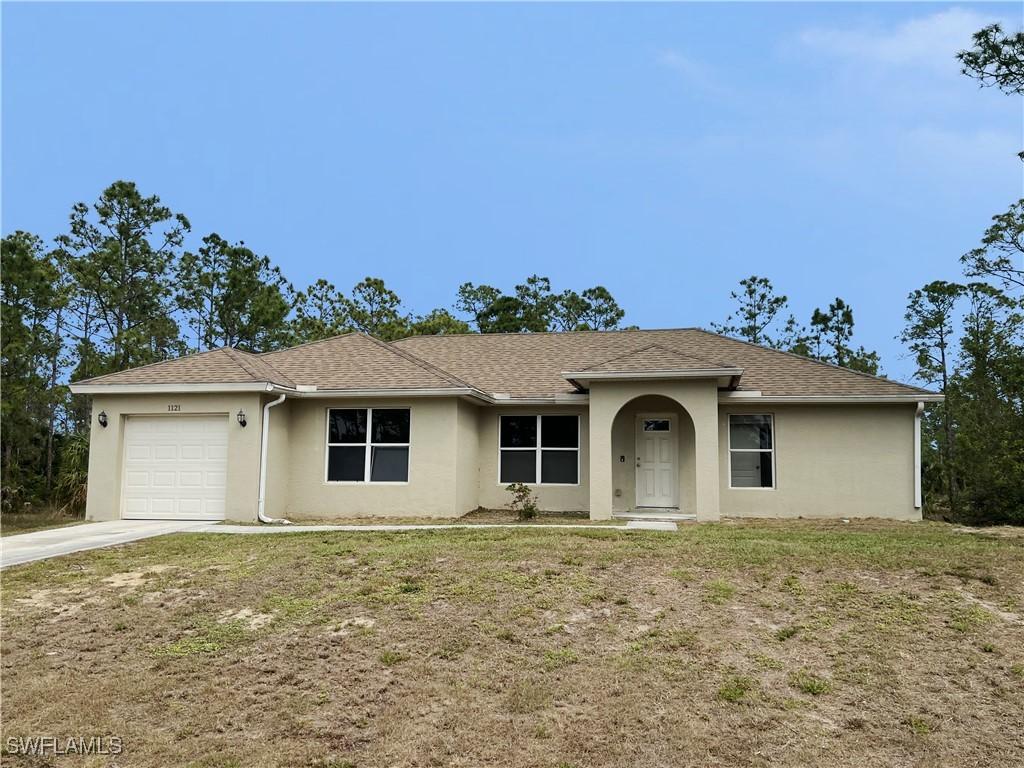1121 Catenary St, Lehigh Acres, FL 33974 - photo 1
