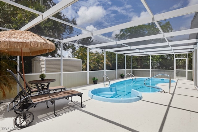 13219 2nd St, Fort Myers, FL 33905 - swimming pool featuring a patio and glass enclosure