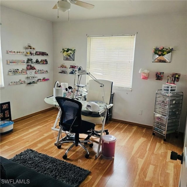 3411 22nd St SW, Lehigh Acres, FL 33976 - home office featuring light wood-style flooring, a ceiling fan, and baseboards