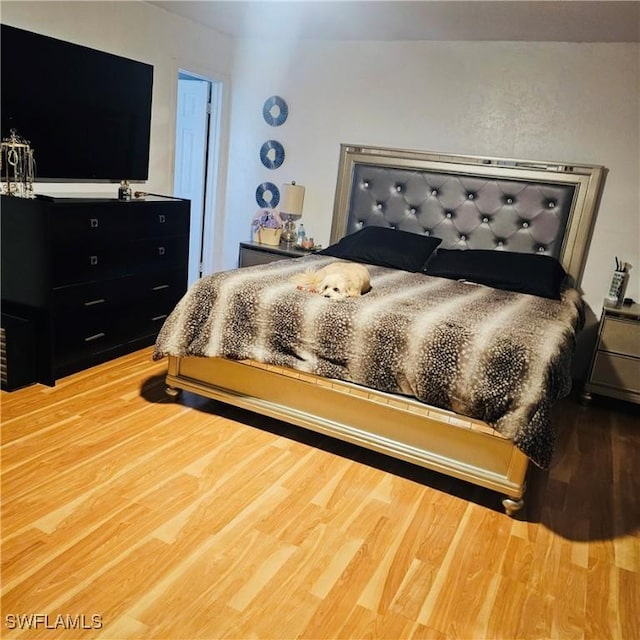 3411 22nd St SW, Lehigh Acres, FL 33976 - bedroom with wood finished floors