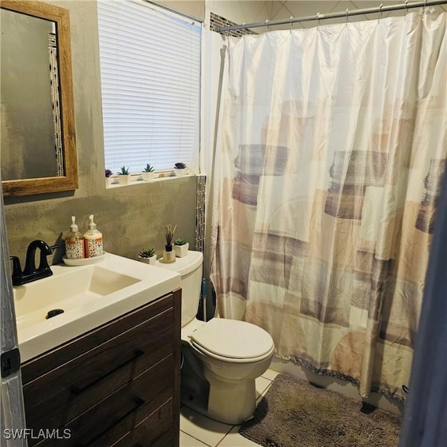 3411 22nd St SW, Lehigh Acres, FL 33976 - bathroom with vanity, tile patterned flooring, toilet, and a shower with shower curtain