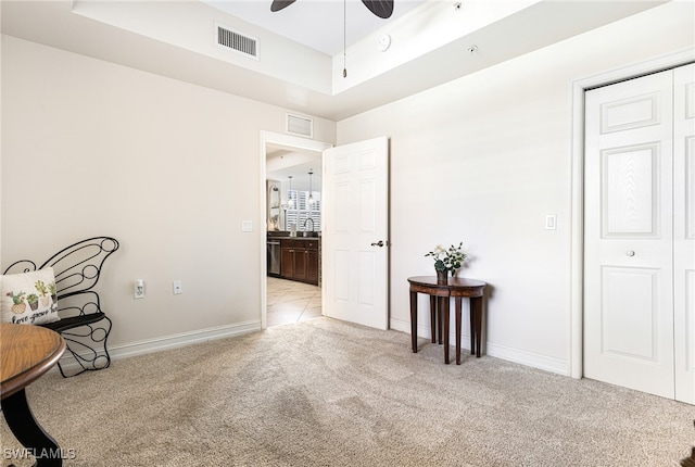 10530 Amiata Way Unit 201, Fort Myers, FL 33913 - sitting room with carpet, ceiling fan, and baseboards